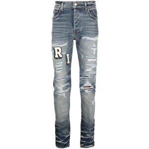 AMIRI Skinny-Fit Logo-Appliquéd Stretch Distressed Jeans